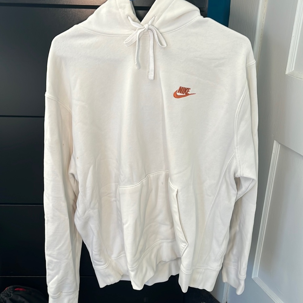 L men’s white nike hoodie with gold/orange symbol